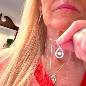 14 Kt white gold 1ct Center stone. Over 2.5cts total Necklace